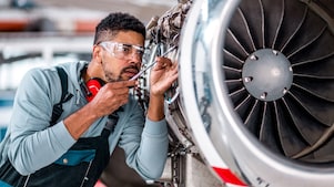 Shell Engineer checking the airplane jet